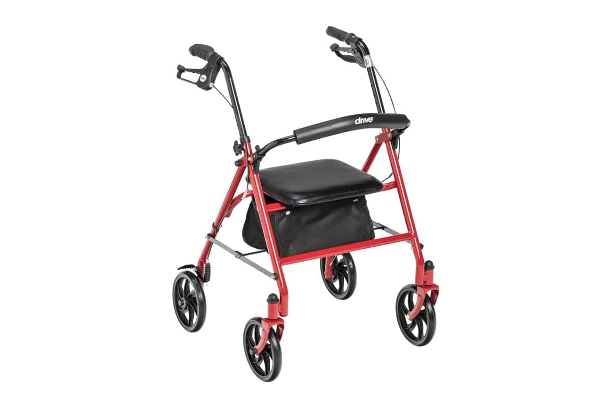 Red four-wheel rolling walker with hand brakes, a padded seat, and a storage pouch